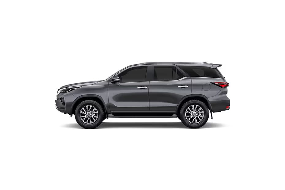 Toyota Fortuner 4X2 AT SUV Petrol car front three-quarter view India 2026 price mileage safety specs side by side car comparison vs Mahindra Scorpio N AiCarAdvisor